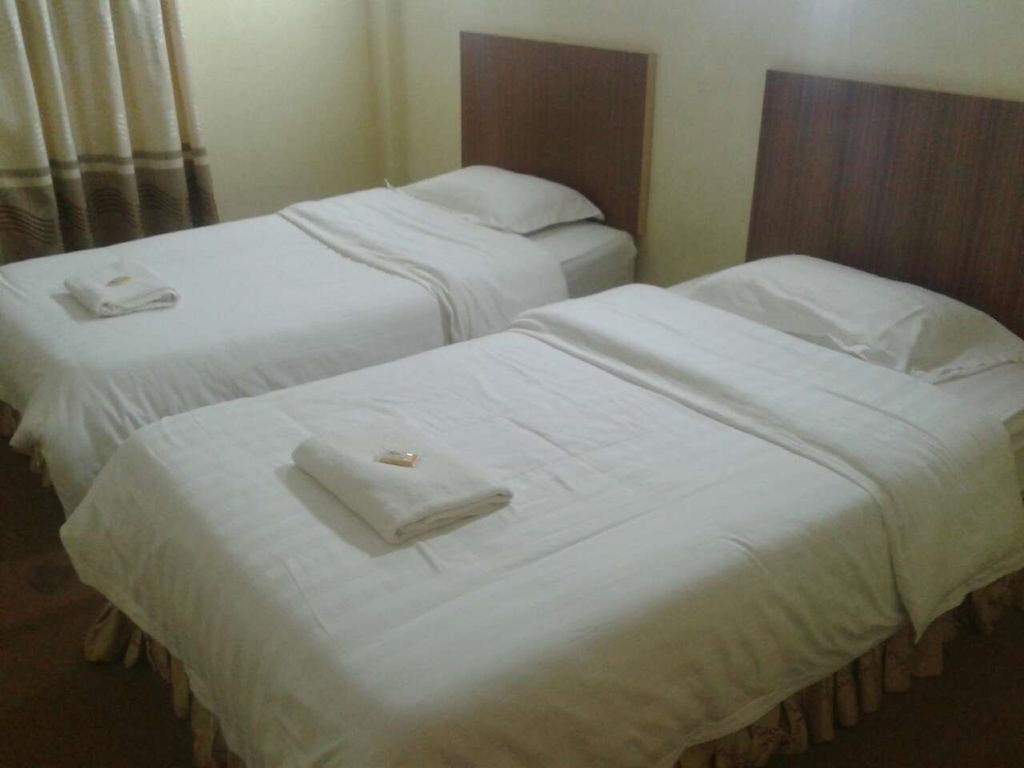 The Garden Inn Miri Room photo