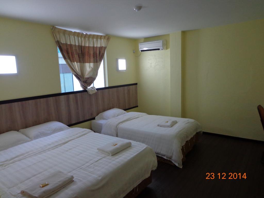 The Garden Inn Miri Room photo