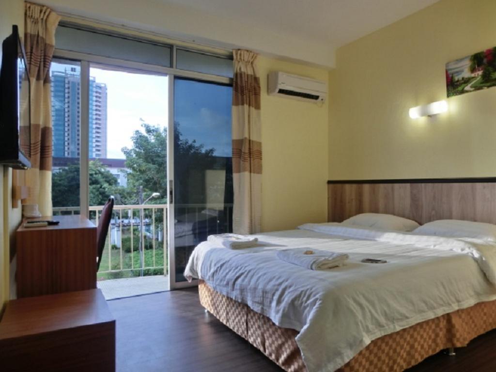 The Garden Inn Miri Room photo