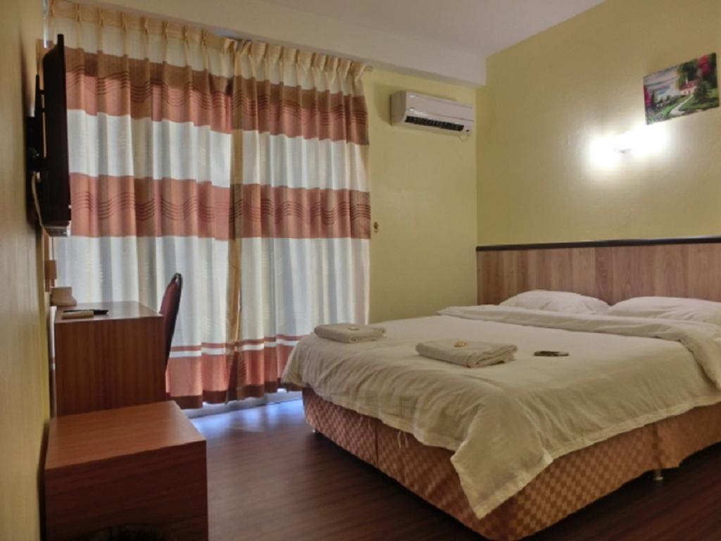 The Garden Inn Miri Room photo